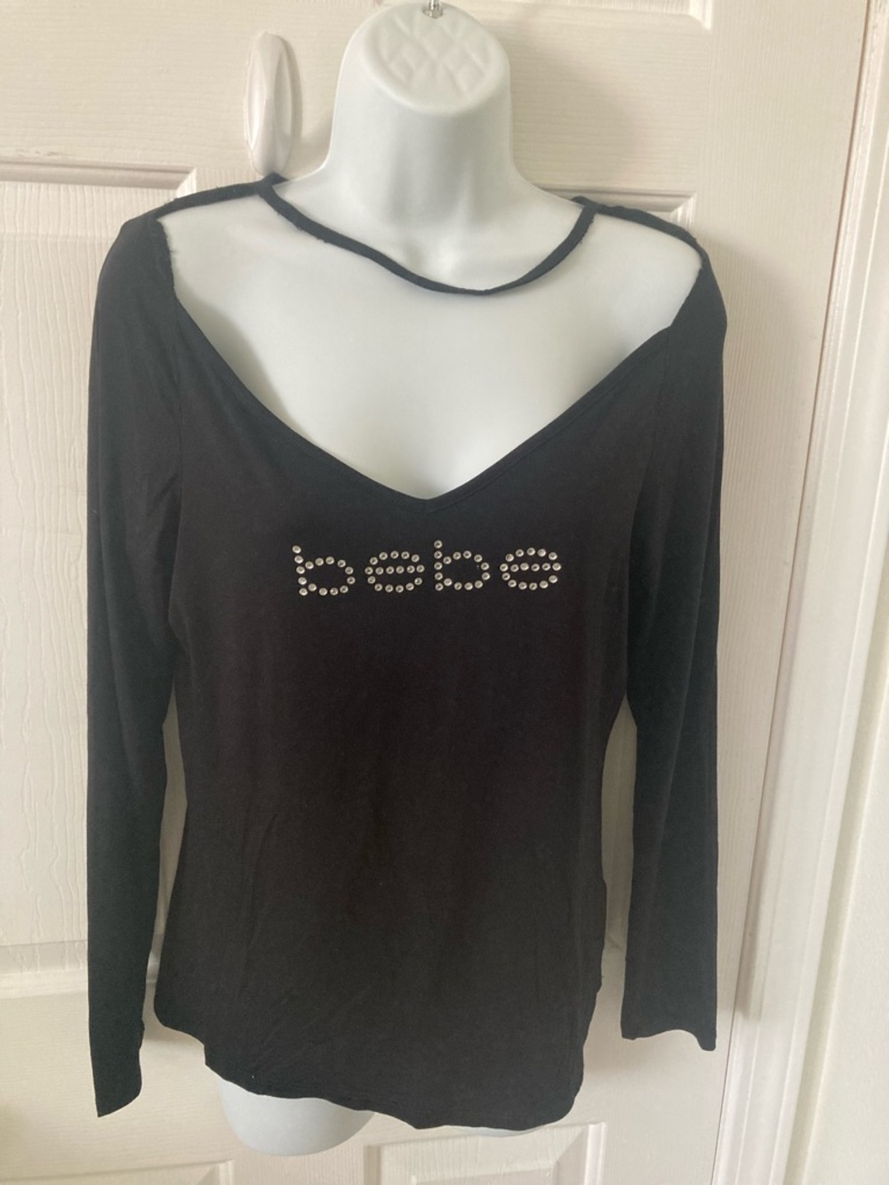 bebe Black Long Sleeve Rhinestone Logo Top with Cutout Neckline